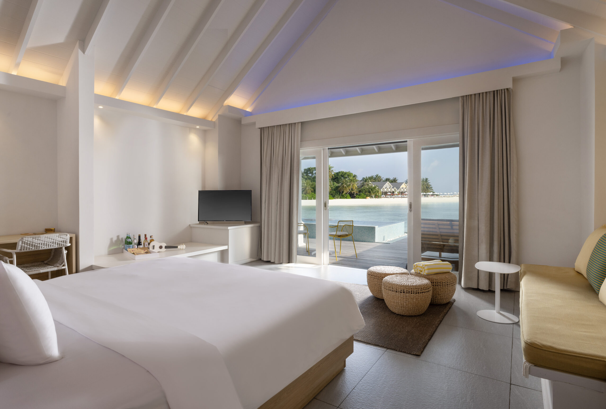 Maldives villa bedroom with lagoon view