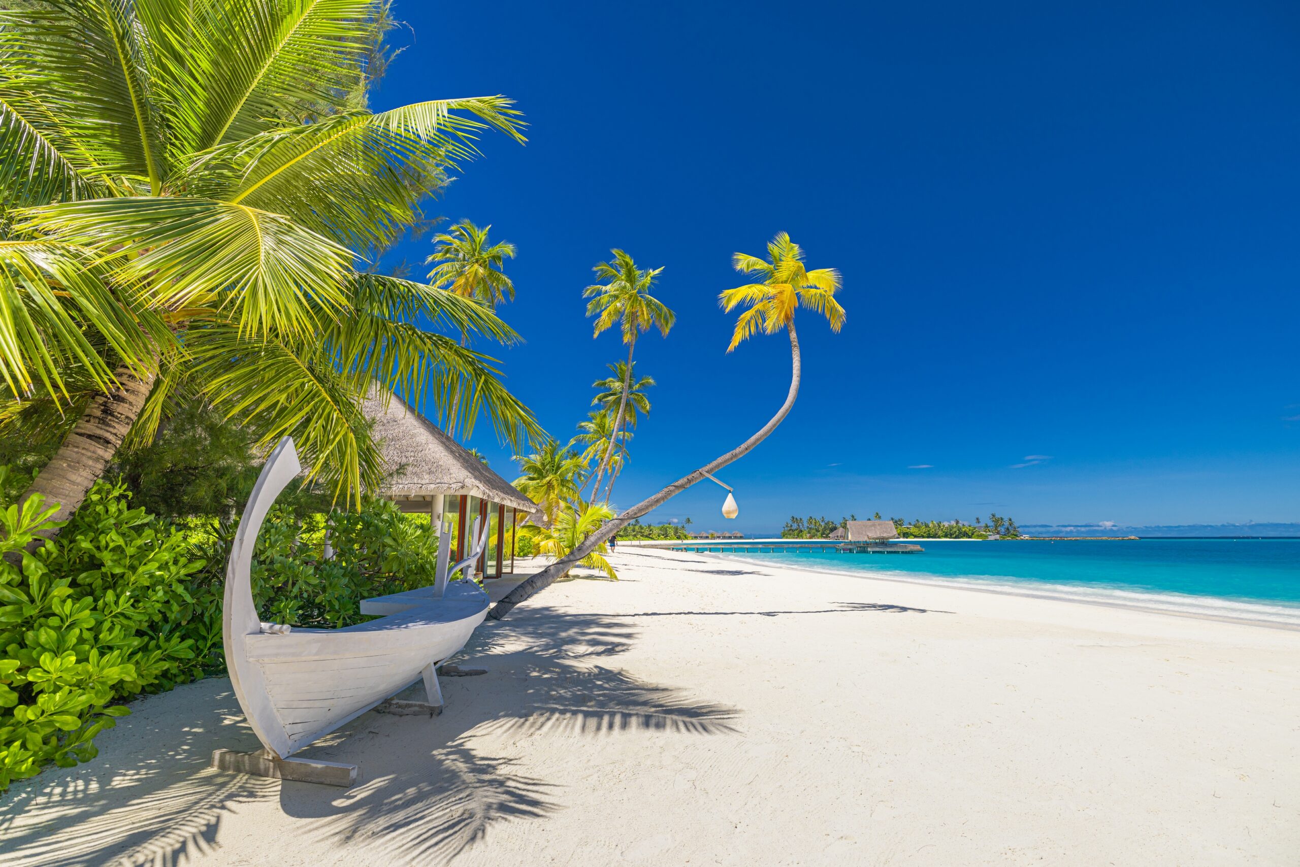 Maldives resort surrounded by turquoise lagoon